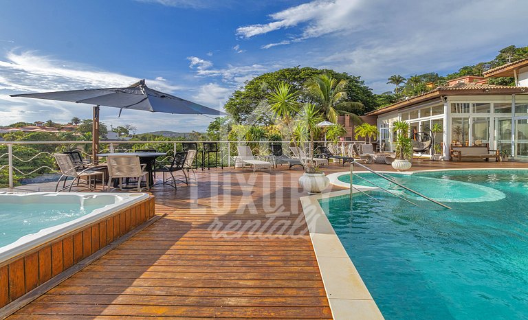 Mansão frente Praia Ferradura por Luxury Rentals